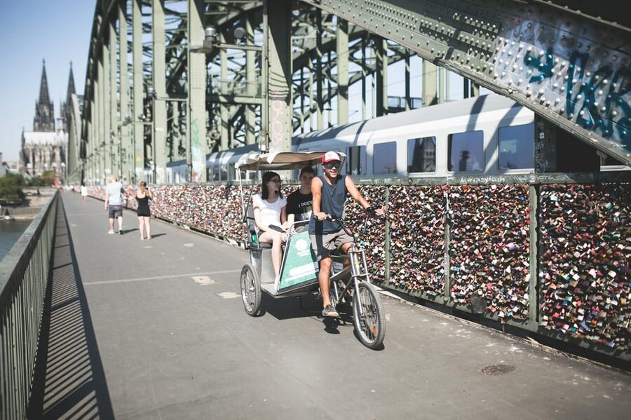 Cologne: Private Rickshaw Tour - Choosing the riverfront route to Rheinauhafen