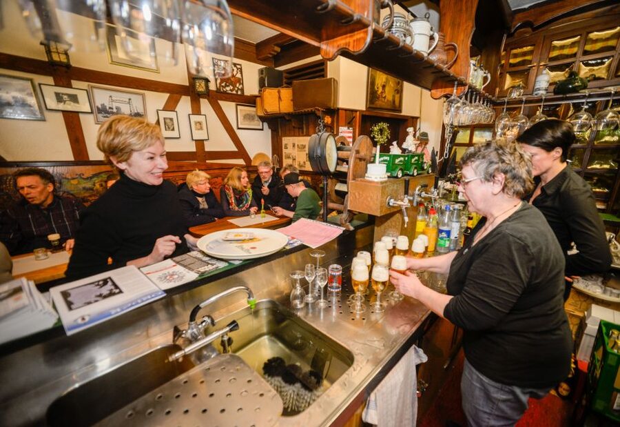 Duisburg-Ruhrot: Historic Harbor Pub Tour - The guide’s storytelling is the real attraction