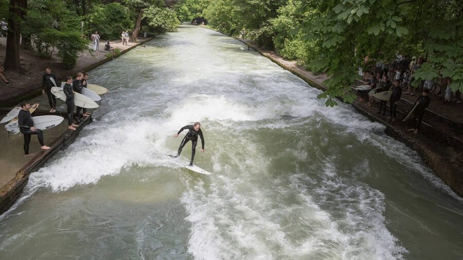 Munich: Eisbachwelle River Surfing Experience - Cold water, age limits, and physical demands